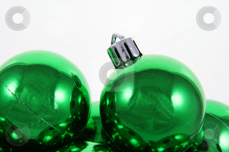 To use this stock image in your creative project, please select the size you need over to the right and click the "Add to Cart" button.
Your downloaded image will come with the Cutcaster watermark removed so don’t worry about the watermark you see on this page. Shiny Green Baubles stock photo, A bunch of green Christmas baubles against a white background.
by Chris Hill