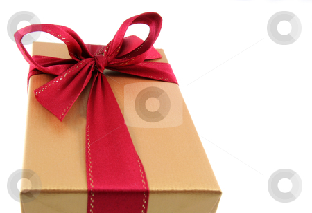 To use this stock image in your creative project, please select the size you need over to the right and click the "Add to Cart" button.
Your downloaded image will come with the Cutcaster watermark removed so don’t worry about the watermark you see on this page. Golden Christmas Present stock photo, A Christmas present wrapped in gold paper with red ribbon.
by Chris Hill