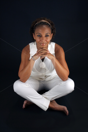 To use this stock image in your creative project, please select the size you need over to the right and click the "Add to Cart" button.
Your downloaded image will come with the Cutcaster watermark removed so don’t worry about the watermark you see on this page. Beautiful Mature Black Woman Sitting (2) stock photo, A lovely mature black woman sits on a black background with her legs crossed, allowing you to easily insert something for her to sit on or extract her from the black background to have her sitting on something. by Carl Stewart