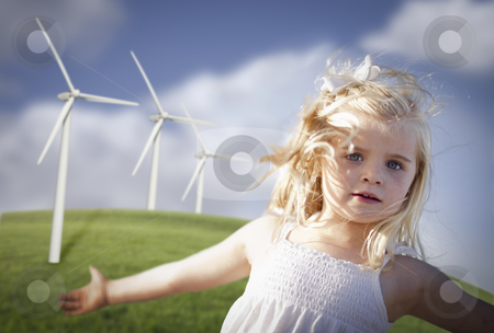 To use this stock image in your creative project, please select the size you need over to the right and click the "Add to Cart" button.
Your downloaded image will come with the Cutcaster watermark removed so don’t worry about the watermark you see on this page. Beautiful Young Girl and Wind Turbine Field stock photo, Beautiful Young Girl Playing Near Wind Turbines and Grass Field. by Andy Dean