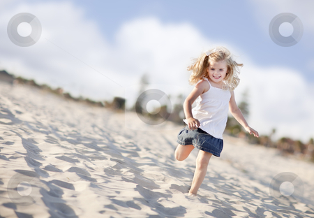 To use this stock image in your creative project, please select the size you need over to the right and click the "Add to Cart" button.
Your downloaded image will come with the Cutcaster watermark removed so don’t worry about the watermark you see on this page. Adorable Little Girl Having Fun at the Beach stock photo, Adorable Little Girl Having Fun at the Beach One Sunny Afternoon. by Andy Dean