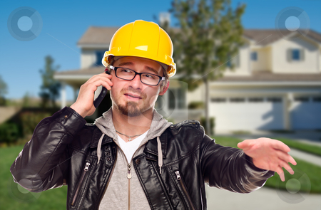 To use this stock image in your creative project, please select the size you need over to the right and click the "Add to Cart" button.
Your downloaded image will come with the Cutcaster watermark removed so don’t worry about the watermark you see on this page. Contractor Wearing Hard Hat on Phone In Front of House stock photo, Young Contractor Wearing Hard Hat on Cell Phone In Front of House. by Andy Dean