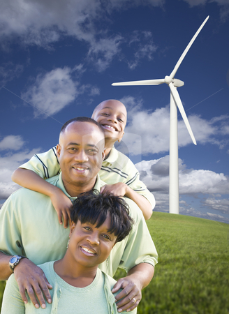 To use this stock image in your creative project, please select the size you need over to the right and click the "Add to Cart" button.
Your downloaded image will come with the Cutcaster watermark removed so don’t worry about the watermark you see on this page. Happy African American Family and Wind Turbine stock photo, Happy African American Family and Wind Turbine with Dramatic Sky and Clouds. by Andy Dean