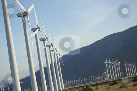 To use this stock image in your creative project, please select the size you need over to the right and click the "Add to Cart" button.
Your downloaded image will come with the Cutcaster watermark removed so don’t worry about the watermark you see on this page. Dramatic Wind Turbine Farm stock photo, Dramatic Wind Turbine Farm in the Desert of California. by Andy Dean
