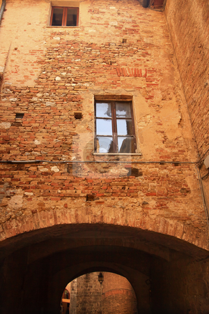 To use this stock image in your creative project, please select the size you need over to the right and click the "Add to Cart" button.
Your downloaded image will come with the Cutcaster watermark removed so don’t worry about the watermark you see on this page. Ancient Stone Arch Medieval Town Street San Gimignano Tuscany It stock photo, Ancient Stone Arch Medieval Town Street San Gimignano Tuscany Italy by William Perry