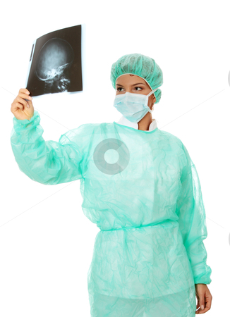 To use this stock image in your creative project, please select the size you need over to the right and click the "Add to Cart" button.
Your downloaded image will come with the Cutcaster watermark removed so don’t worry about the watermark you see on this page. X-ray stock photo, Female doctor examining a head x-ray photo scan. Isolated on white by Piotr_Marcinski