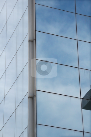 To use this stock image in your creative project, please select the size you need over to the right and click the "Add to Cart" button.
Your downloaded image will come with the Cutcaster watermark removed so don’t worry about the watermark you see on this page. Mirrored sky stock photo, Sky mirrored on the windows of a modern glass building. Architectural detail. by sirylok