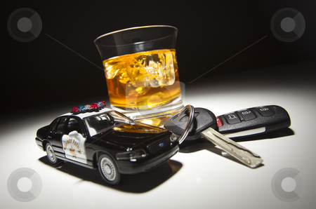 To use this stock image in your creative project, please select the size you need over to the right and click the "Add to Cart" button.
Your downloaded image will come with the Cutcaster watermark removed so don’t worry about the watermark you see on this page. Highway Patrol Police Car Next to Alcoholic Drink and Keys stock photo, Highway Patrol Police Car Next to Alcoholic Drink and Keys Under Spot Light. by Andy Dean