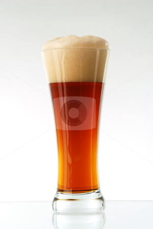 To use this stock image in your creative project, please select the size you need over to the right and click the "Add to Cart" button.
Your downloaded image will come with the Cutcaster watermark removed so don’t worry about the watermark you see on this page. Glass of beer stock photo, Glass of beer close-up with froth by sutike