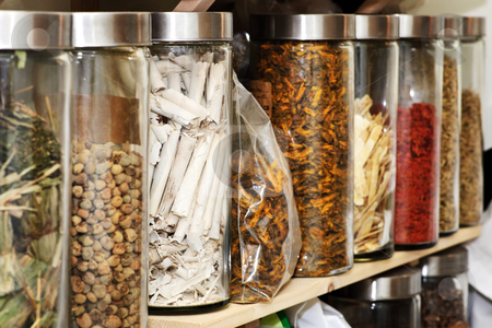 To use this stock image in your creative project, please select the size you need over to the right and click the "Add to Cart" button.
Your downloaded image will come with the Cutcaster watermark removed so don’t worry about the watermark you see on this page. Traditional Chinese herbal medicines stock photo, Traditional chinese medicine herbs and remedies in jars by Elena Elisseeva
