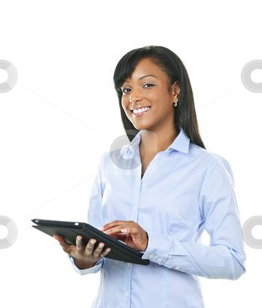 To use this stock image in your creative project, please select the size you need over to the right and click the "Add to Cart" button.
Your downloaded image will come with the Cutcaster watermark removed so don’t worry about the watermark you see on this page. Happy woman with tablet computer stock photo, Young smiling black woman using tablet computer by Elena Elisseeva