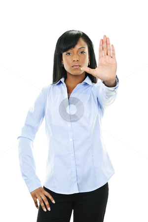 To use this stock image in your creative project, please select the size you need over to the right and click the "Add to Cart" button.
Your downloaded image will come with the Cutcaster watermark removed so don’t worry about the watermark you see on this page. Serious young woman giving stop gesture stock photo, Serious black woman showing stop hand gesture isolated on white background by Elena Elisseeva