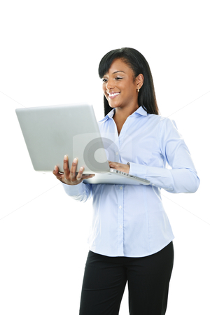 To use this stock image in your creative project, please select the size you need over to the right and click the "Add to Cart" button.
Your downloaded image will come with the Cutcaster watermark removed so don’t worry about the watermark you see on this page. Smiling woman with laptop computer stock photo, Young smiling black woman standing with laptop computer by Elena Elisseeva