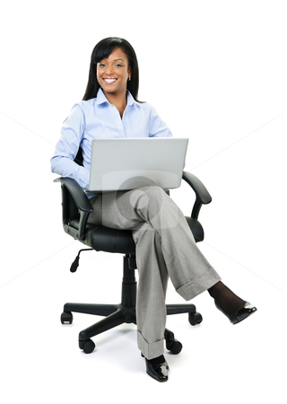 To use this stock image in your creative project, please select the size you need over to the right and click the "Add to Cart" button.
Your downloaded image will come with the Cutcaster watermark removed so don’t worry about the watermark you see on this page. Businesswoman sitting in office chair with computer stock photo, Young smiling black business woman sitting in leather office chair with laptop computer by Elena Elisseeva