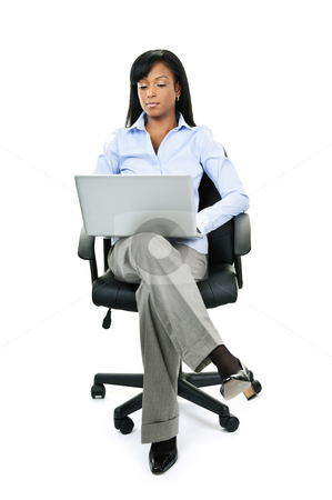 To use this stock image in your creative project, please select the size you need over to the right and click the "Add to Cart" button.
Your downloaded image will come with the Cutcaster watermark removed so don’t worry about the watermark you see on this page. Woman sitting in office chair with computer stock photo, Young serious black woman sitting in leather office chair with laptop computer by Elena Elisseeva