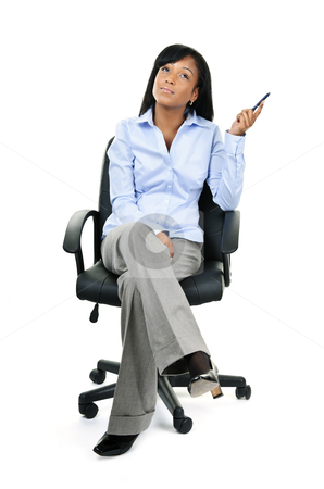 To use this stock image in your creative project, please select the size you need over to the right and click the "Add to Cart" button.
Your downloaded image will come with the Cutcaster watermark removed so don’t worry about the watermark you see on this page. Thinking businesswoman sitting on office chair stock photo, Young black businesswoman sitting and thinking in leather office chair by Elena Elisseeva