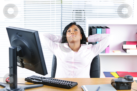To use this stock image in your creative project, please select the size you need over to the right and click the "Add to Cart" button.
Your downloaded image will come with the Cutcaster watermark removed so don’t worry about the watermark you see on this page. Black businesswoman resting at desk stock photo, Young black business woman resting at desk in office by Elena Elisseeva