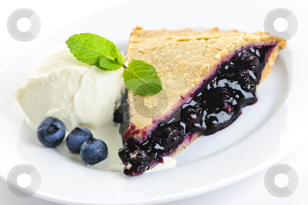 To use this stock image in your creative project, please select the size you need over to the right and click the "Add to Cart" button.
Your downloaded image will come with the Cutcaster watermark removed so don’t worry about the watermark you see on this page. Blueberry pie slice stock photo, Slice of blueberry pie with vanilla ice cream and berries by Elena Elisseeva