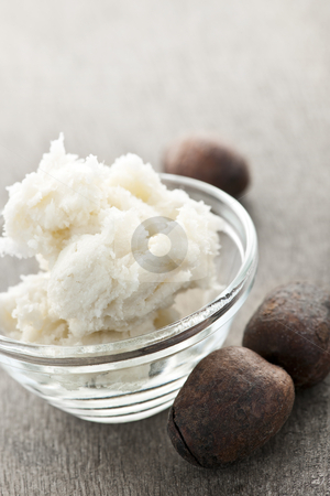 To use this stock image in your creative project, please select the size you need over to the right and click the "Add to Cart" button.
Your downloaded image will come with the Cutcaster watermark removed so don’t worry about the watermark you see on this page. Shea butter and nuts in bowl stock photo, Shea nuts and sheabutter in glass bowl by Elena Elisseeva