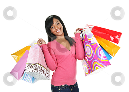 To use this stock image in your creative project, please select the size you need over to the right and click the "Add to Cart" button.
Your downloaded image will come with the Cutcaster watermark removed so don’t worry about the watermark you see on this page. Happy young black woman with shopping bags stock photo, Young smiling black woman holding colorful shopping bags by Elena Elisseeva