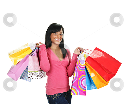 To use this stock image in your creative project, please select the size you need over to the right and click the "Add to Cart" button.
Your downloaded image will come with the Cutcaster watermark removed so don’t worry about the watermark you see on this page. Happy young black woman with shopping bags stock photo, Young smiling black woman holding colorful shopping bags by Elena Elisseeva