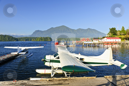 To use this stock image in your creative project, please select the size you need over to the right and click the "Add to Cart" button.
Your downloaded image will come with the Cutcaster watermark removed so don’t worry about the watermark you see on this page. Sea planes at dock in Tofino, Vancouver Island, Canada stock photo, Seaplanes at dock in Tofino on Pacific coast of British Columbia, Canada by Elena Elisseeva