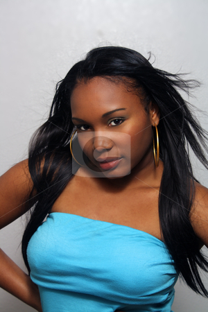To use this stock image in your creative project, please select the size you need over to the right and click the "Add to Cart" button.
Your downloaded image will come with the Cutcaster watermark removed so don’t worry about the watermark you see on this page. Beautiful Haitian Girl, Headshot (7) stock photo, A close-up of a lovely young Haitian girl. by Carl Stewart