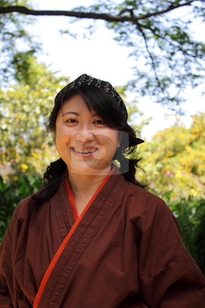 To use this stock image in your creative project, please select the size you need over to the right and click the "Add to Cart" button.
Your downloaded image will come with the Cutcaster watermark removed so don’t worry about the watermark you see on this page. Japanese women stock photo, portrait of a Japanese woman with traditional clothing by Henrik Lehnerer