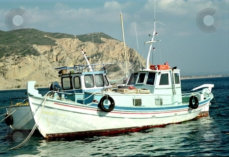 To use this stock image in your creative project, please select the size you need over to the right and click the "Add to Cart" button.
Your downloaded image will come with the Cutcaster watermark removed so don’t worry about the watermark you see on this page. Greek Fishing Boats in a bay on Crete stock photo, Two Greek Fishing Boats in the bay of Agia Galini on Crete by d40xboy