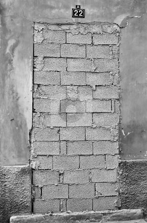To use this stock image in your creative project, please select the size you need over to the right and click the "Add to Cart" button.
Your downloaded image will come with the Cutcaster watermark removed so don’t worry about the watermark you see on this page. Bricked up door stock photo, Bricked up door and weathered wall of an abandoned building. Black and white. by sirylok
