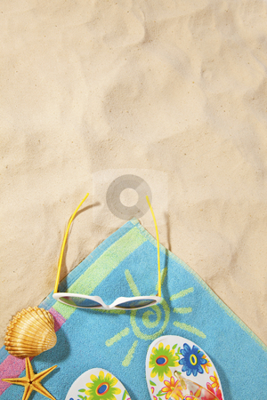 To use this stock image in your creative project, please select the size you need over to the right and click the "Add to Cart" button.
Your downloaded image will come with the Cutcaster watermark removed so don’t worry about the watermark you see on this page. Beach concept with towel stock photo, beach items on a towel with copy-space by twixx