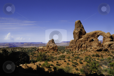 To use this stock image in your creative project, please select the size you need over to the right and click the "Add to Cart" button.
Your downloaded image will come with the Cutcaster watermark removed so don’t worry about the watermark you see on this page. Arches National Park stock photo, Looking out over the terrain in Arches National Park by Don Fink