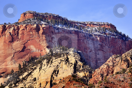 To use this stock image in your creative project, please select the size you need over to the right and click the "Add to Cart" button.
Your downloaded image will come with the Cutcaster watermark removed so don’t worry about the watermark you see on this page. Red Rock Canyon Snow West Temple Zion National Park Utah stock photo, The West Temple Red Rock Canyon Snow Evergreens Towers of Virgin Zion Canyon National Park Utah Southwest by William Perry