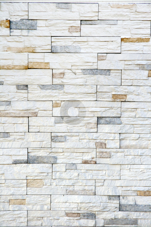To use this stock image in your creative project, please select the size you need over to the right and click the "Add to Cart" button.
Your downloaded image will come with the Cutcaster watermark removed so don’t worry about the watermark you see on this page. Wall stones stock photo, White and yellow wall stones on the wall by OZMedia