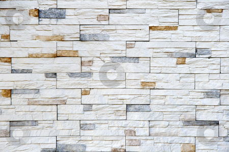 To use this stock image in your creative project, please select the size you need over to the right and click the "Add to Cart" button.
Your downloaded image will come with the Cutcaster watermark removed so don’t worry about the watermark you see on this page. Wall stones stock photo, White and yellow wall stones on the wall by OZMedia