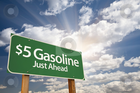 To use this stock image in your creative project, please select the size you need over to the right and click the "Add to Cart" button.
Your downloaded image will come with the Cutcaster watermark removed so don’t worry about the watermark you see on this page. $5 Gasonline Green Road Sign and Clouds stock photo, $5 Gasonline Green Road Sign with Dramatic Clouds, Sun Rays and Sky. by Andy Dean