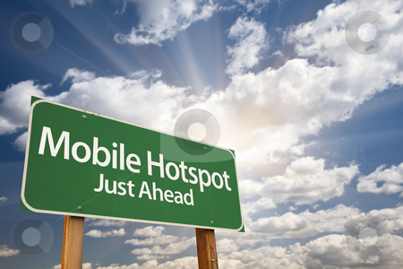 To use this stock image in your creative project, please select the size you need over to the right and click the "Add to Cart" button.
Your downloaded image will come with the Cutcaster watermark removed so don’t worry about the watermark you see on this page. Mobile Hotspot Green Road Sign and Clouds stock photo, Mobile Hotspot Green Road Sign with Dramatic Clouds, Sun Rays and Sky. by Andy Dean