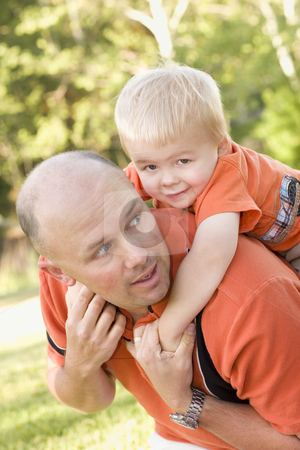 To use this stock image in your creative project, please select the size you need over to the right and click the "Add to Cart" button.
Your downloaded image will come with the Cutcaster watermark removed so don’t worry about the watermark you see on this page. Father and Son Piggyback in the Park stock photo, Father and Son Piggyback Ride in the Park.
by Andy Dean