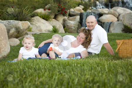 To use this stock image in your creative project, please select the size you need over to the right and click the "Add to Cart" button.
Your downloaded image will come with the Cutcaster watermark removed so don’t worry about the watermark you see on this page. Happy Young Family with Twins Portrait in Park stock photo, Happy Young Adorable Family with Twins Portrait on Grass in the Park. by Andy Dean