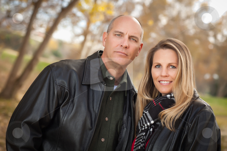 To use this stock image in your creative project, please select the size you need over to the right and click the "Add to Cart" button.
Your downloaded image will come with the Cutcaster watermark removed so don’t worry about the watermark you see on this page. Attractive Couple in Park with Leather Jackets stock photo, Happy, Attractive Couple in Park with Leather Jackets. by Andy Dean