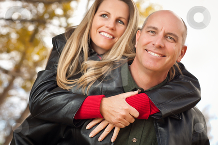To use this stock image in your creative project, please select the size you need over to the right and click the "Add to Cart" button.
Your downloaded image will come with the Cutcaster watermark removed so don’t worry about the watermark you see on this page. Attractive Couple in Park with Leather Jackets stock photo, Happy, Attractive Couple in Park with Leather Jackets. by Andy Dean