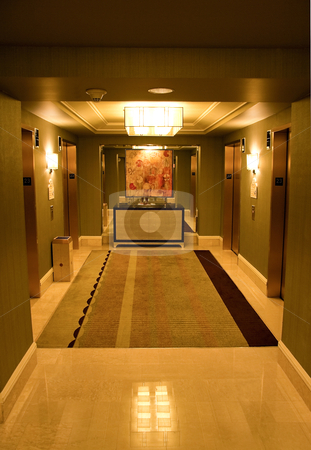 To use this stock image in your creative project, please select the size you need over to the right and click the "Add to Cart" button.
Your downloaded image will come with the Cutcaster watermark removed so don’t worry about the watermark you see on this page. Elevator Lobby stock photo, A hotel elevator lobby that leads to the hotel rooms by Kevin Tietz