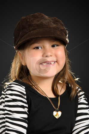 To use this stock image in your creative project, please select the size you need over to the right and click the "Add to Cart" button.
Your downloaded image will come with the Cutcaster watermark removed so don’t worry about the watermark you see on this page. Kindergarten Child stock photo, Portrait of a kindergarten girl smiling and wearing stylish clothes, shot with a backlight. by Richard Nelson