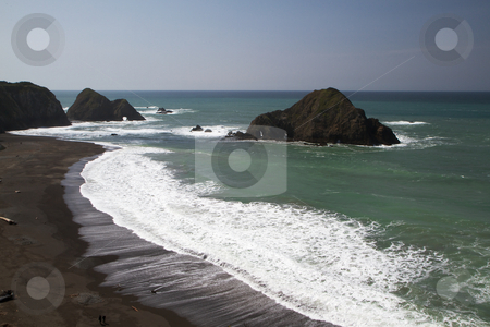 To use this stock image in your creative project, please select the size you need over to the right and click the "Add to Cart" button.
Your downloaded image will come with the Cutcaster watermark removed so don’t worry about the watermark you see on this page. Coastal Rocks and Beach stock photo, California Coastal Rocks and Beach on a blue sky day by bobkeenan
