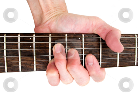 To use this stock image in your creative project, please select the size you need over to the right and click the "Add to Cart" button.
Your downloaded image will come with the Cutcaster watermark removed so don’t worry about the watermark you see on this page. Guitar music instrument stock photo, hand playing guitar chord on rosewood fretboard of music instrument. by JOSEPH S.L. TAN MATT