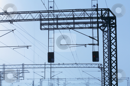 To use this stock image in your creative project, please select the size you need over to the right and click the "Add to Cart" button.
Your downloaded image will come with the Cutcaster watermark removed so don’t worry about the watermark you see on this page. Railroad powerlines stock photo, Railroad powerline silhouettes against hazy sky. by Stocksnapper