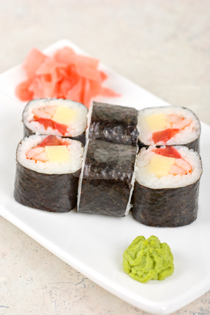 To use this stock image in your creative project, please select the size you need over to the right and click the "Add to Cart" button.
Your downloaded image will come with the Cutcaster watermark removed so don’t worry about the watermark you see on this page. Sushi rolls stock photo, Sushi rolls made of crab meat, cheese, and tomato by olinchuk
