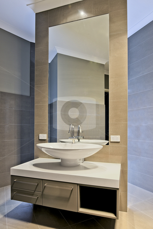 To use this stock image in your creative project, please select the size you need over to the right and click the "Add to Cart" button.
Your downloaded image will come with the Cutcaster watermark removed so don’t worry about the watermark you see on this page. Bathroom stock photo, Modern bathroom design. by thisboy