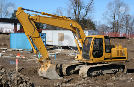 To use this stock image in your creative project, please select the size you need over to the right and click the "Add to Cart" button.
Your downloaded image will come with the Cutcaster watermark removed so don’t worry about the watermark you see on this page. Backhoe stock photo, A large backhoe sitting on construction site. by Chris Hill