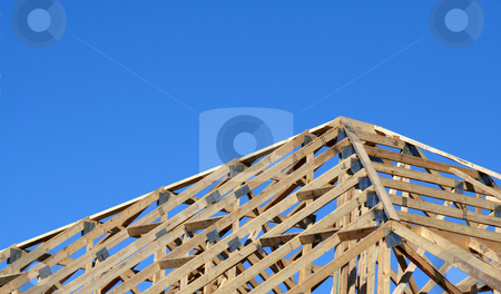 To use this stock image in your creative project, please select the size you need over to the right and click the "Add to Cart" button.
Your downloaded image will come with the Cutcaster watermark removed so don’t worry about the watermark you see on this page. Wood Beam Roof stock photo, The wood beams of a new homes roof.
by Chris Hill